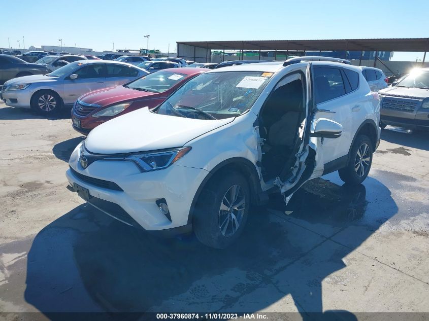 VIN JTMWFREV9JJ208326 2018 TOYOTA RAV4 XLE