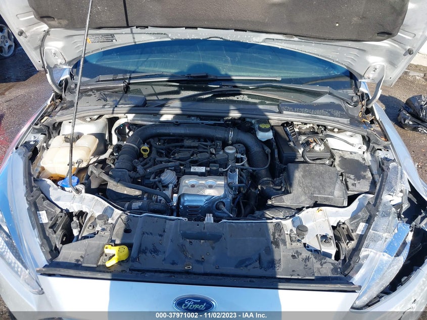 VIN 1FADP3FE3JL219770 2018 FORD FOCUS SE