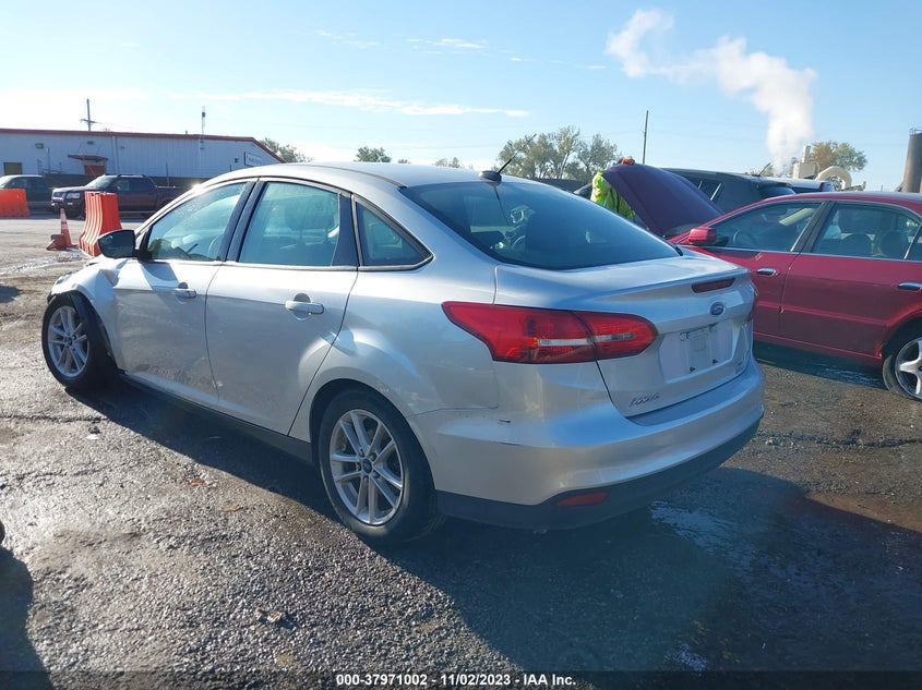 VIN 1FADP3FE3JL219770 2018 FORD FOCUS SE