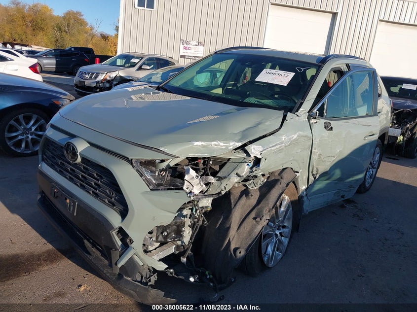 VIN JTMA1RFV9MJ039730 2021 TOYOTA RAV4 XLE PREMIUM