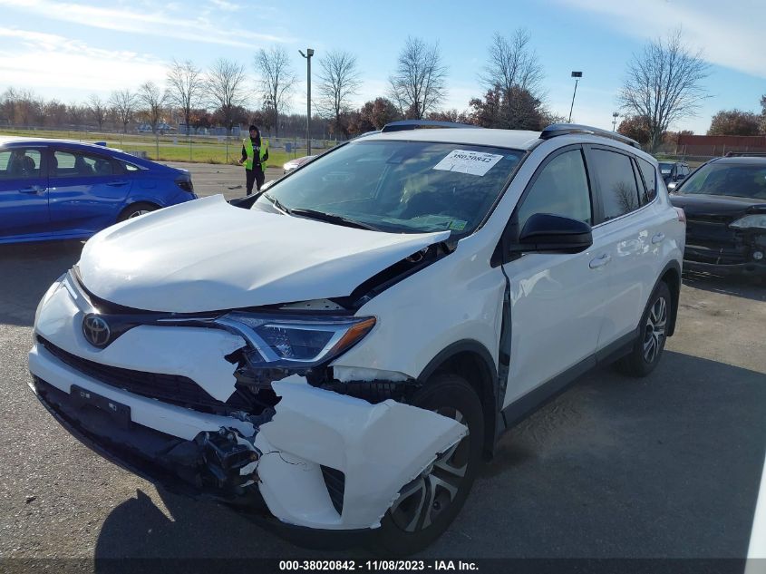 VIN JTMBFREV2JJ185857 2018 TOYOTA RAV4 LE