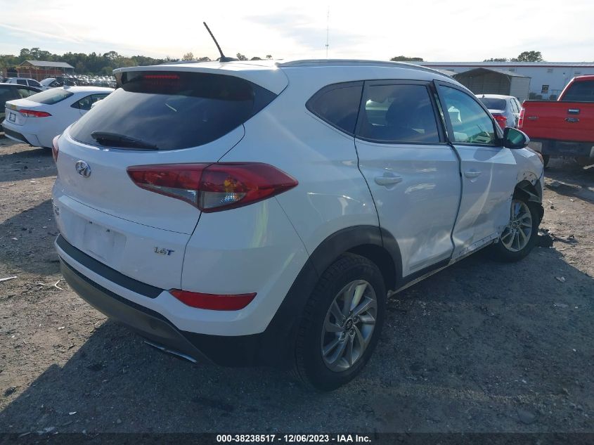 2016 HYUNDAI TUCSON LIMITED/SPORT AND ECO/SE - KM8J33A29GU130516
