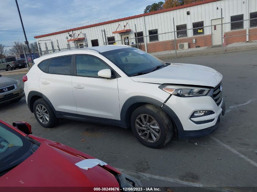 2016 HYUNDAI TUCSON LIMITED/SPORT AND ECO/SE - KM8J3CA43GU091374