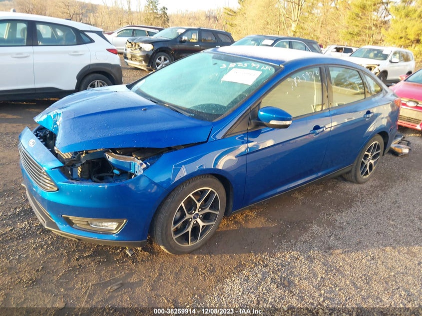 VIN 1FADP3FE3JL309985 2018 FORD FOCUS SE