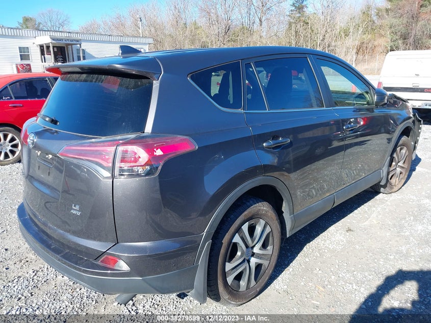 VIN JTMBFREV0JJ738828 2018 TOYOTA RAV4 LE