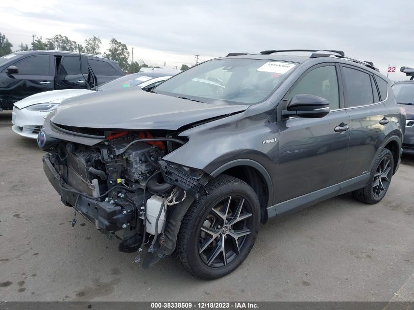 2018 TOYOTA RAV4 HYBRID SE JTMJJREV9JD165730