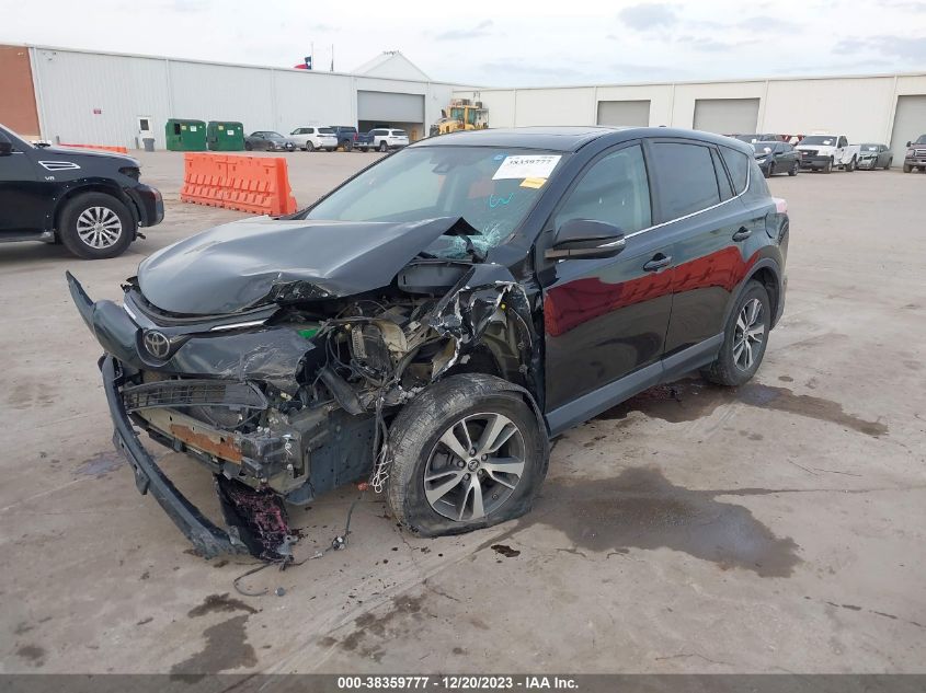 VIN 2T3RFREV8JW798047 2018 TOYOTA RAV4 XLE