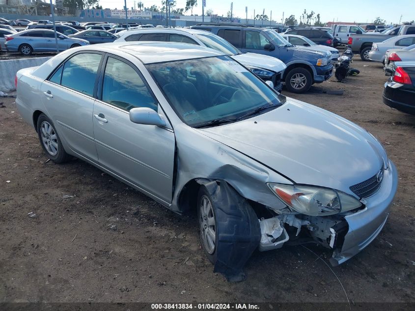 Lot #2532349264 2003 TOYOTA CAMRY XLE salvage car