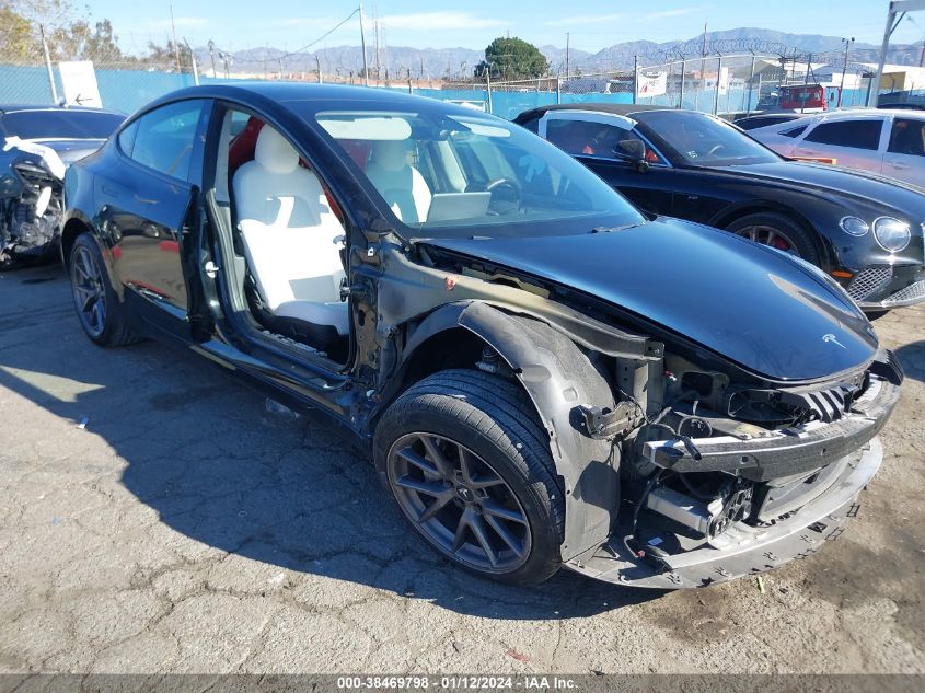 2021 TESLA MODEL 3 STANDARD RANGE PLUS REAR-WHEEL DRIVE - 5YJ3E1EA5MF018443