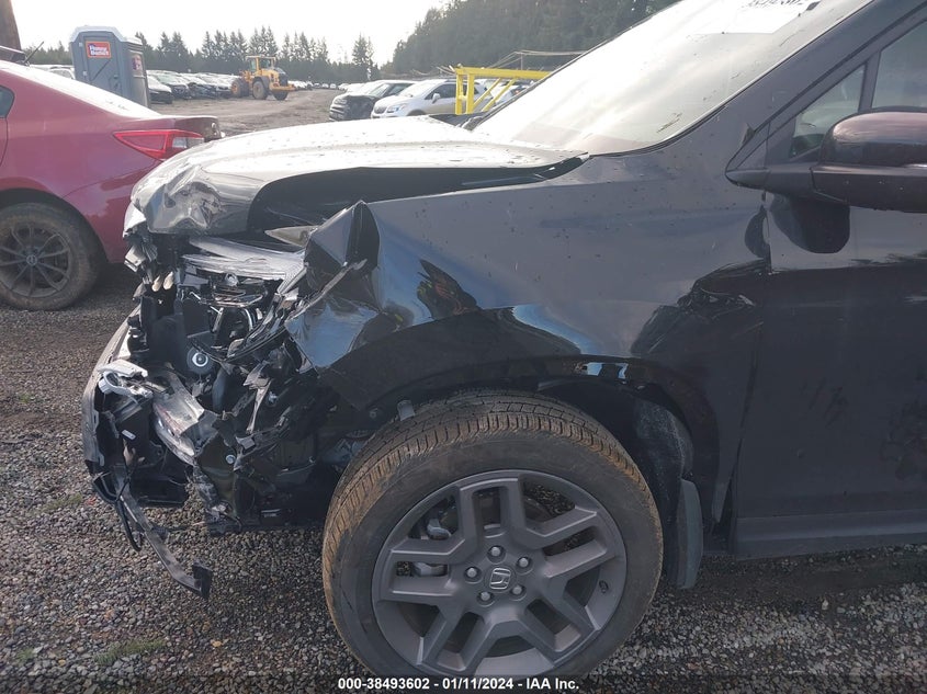 VIN 5FNYF8H52PB013084 2023 HONDA PASSPORT EXL