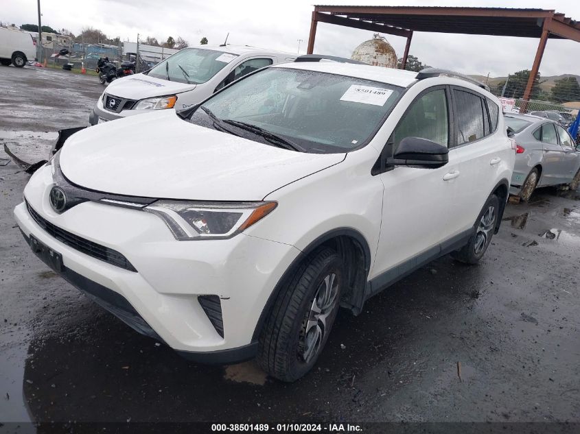 VIN JTMZFREV0JJ728962 2018 TOYOTA RAV4 LE