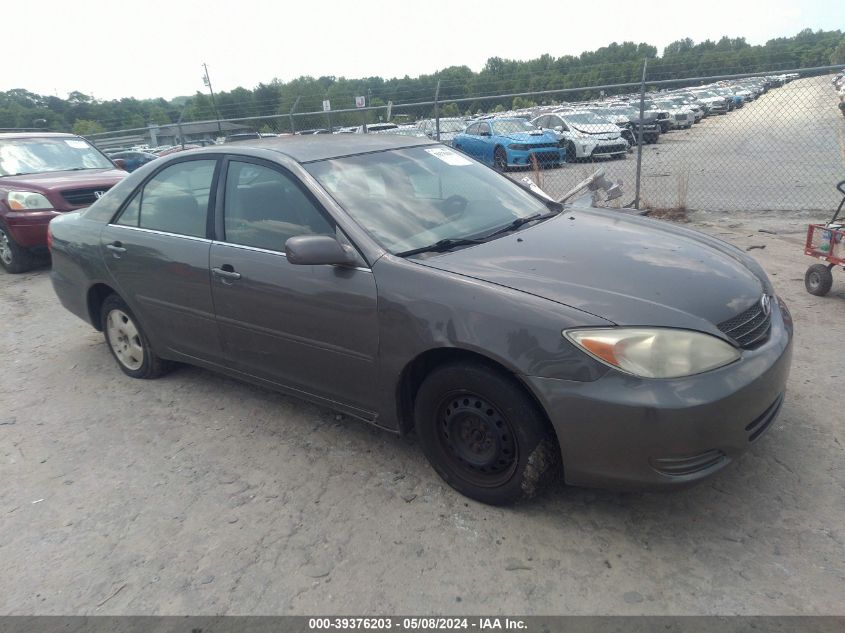 Lot #2525399453 2004 TOYOTA CAMRY LE salvage car