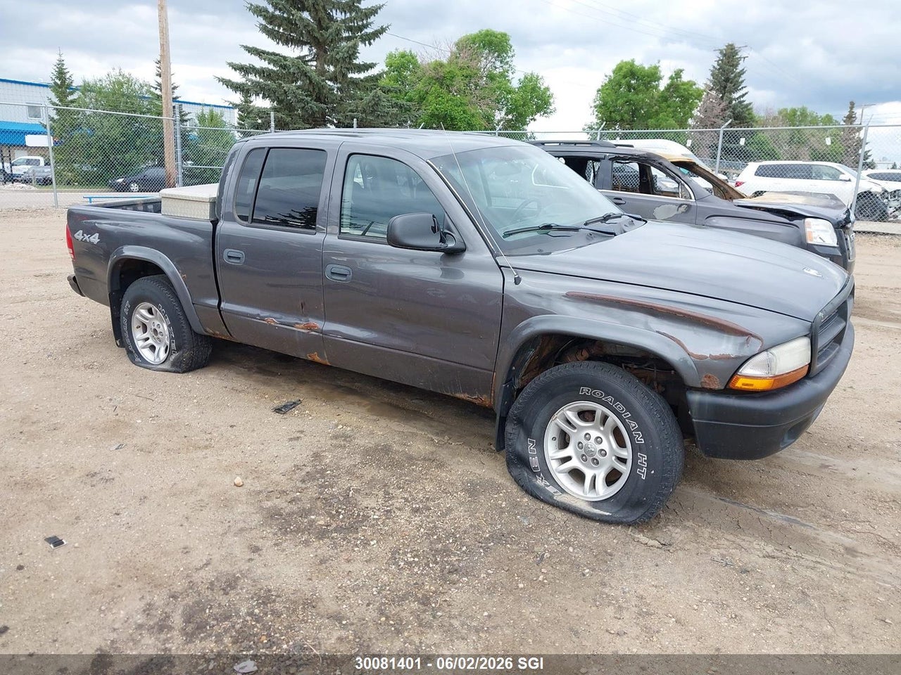 1D7HG38NX4S629443 · 2004 DODGE DAKOTA QUAD SPORT