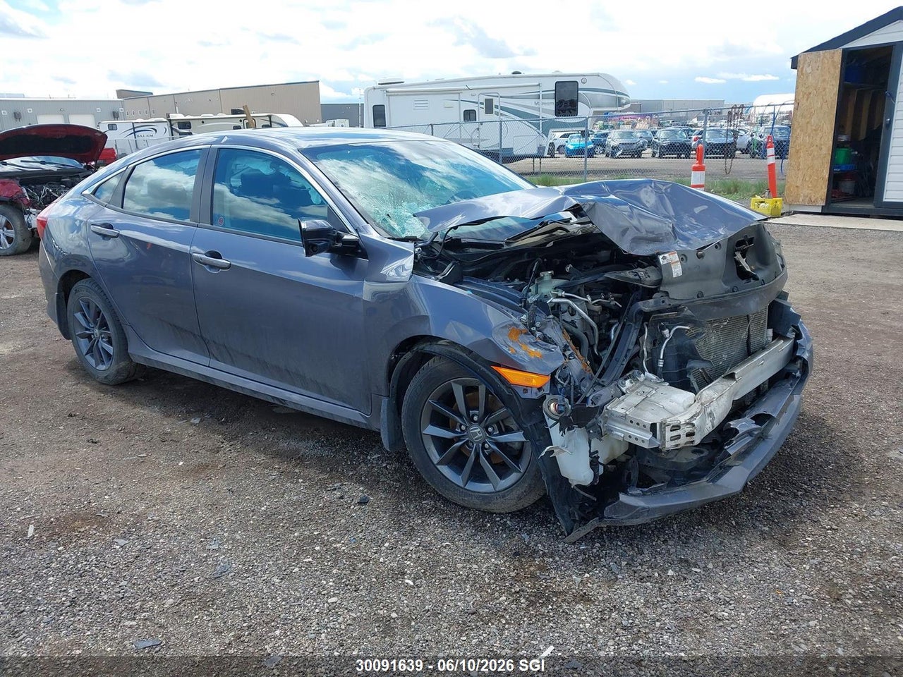 2HGFC2F77LH033628 · 2020 HONDA CIVIC EX