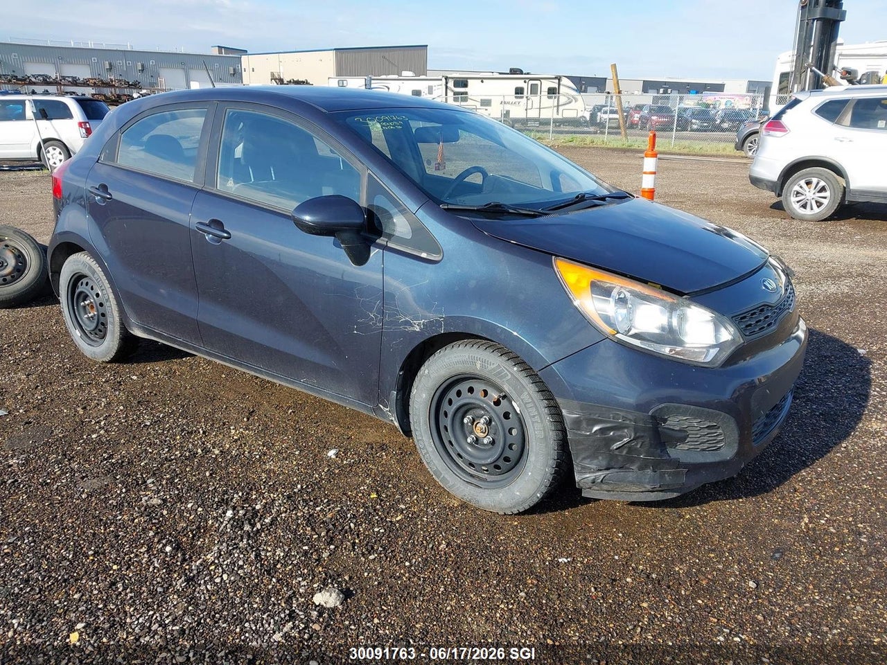 KNADM5A31F6991059 · 2015 KIA RIO LX