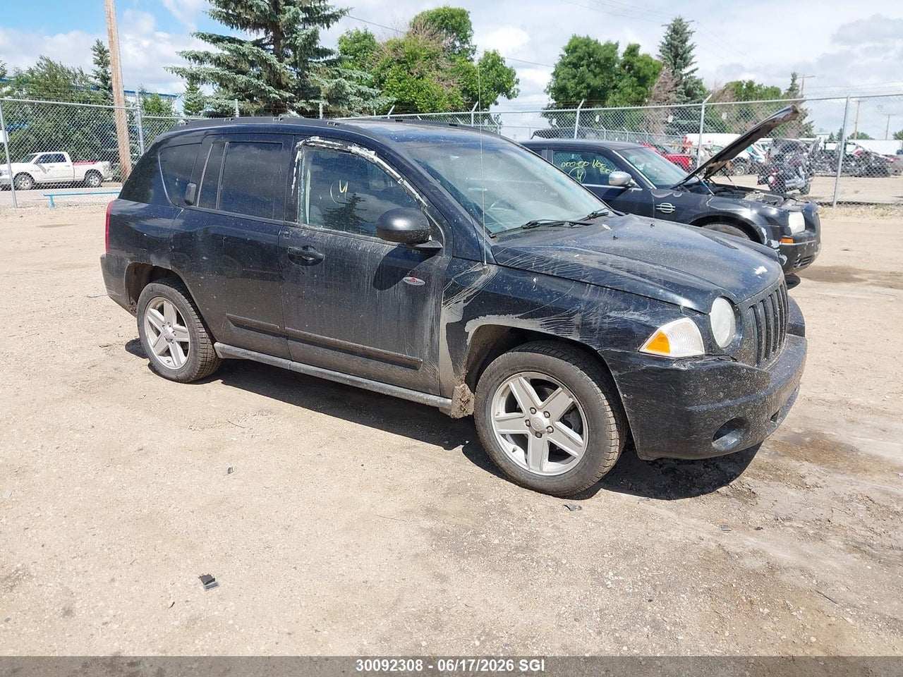 1J4NF4FB4AD520761 · 2010 JEEP COMPASS SPORT