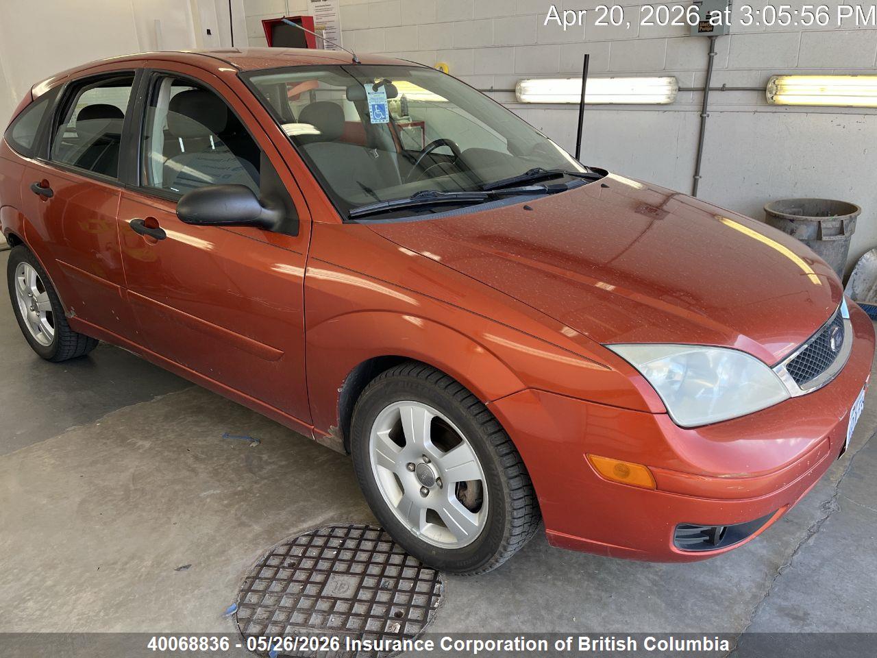 3FAFP37N65R****** · 2005 FORD FOCUS