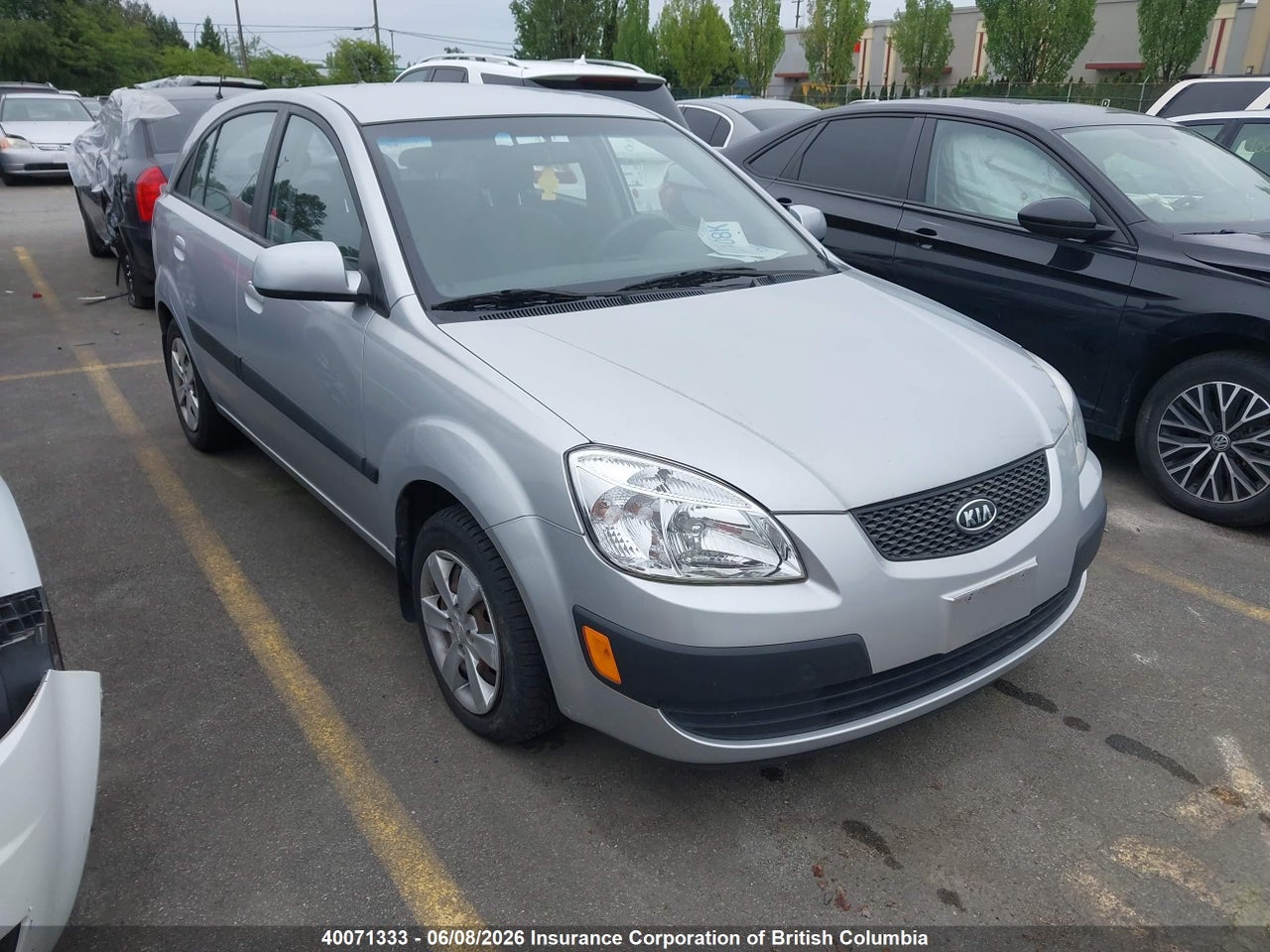 KNADE243096568694 · 2009 KIA RIO 5 SX