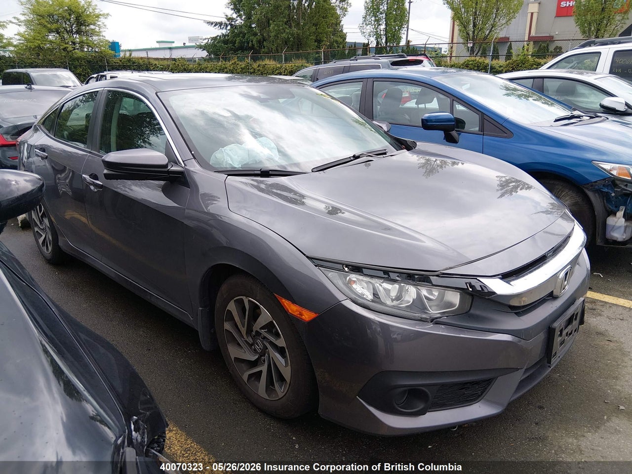 2HGFC2F86JH028135 · 2018 HONDA CIVIC EX