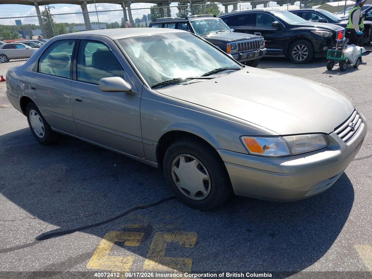 JT2BG22KXX0358823 · 1999 TOYOTA CAMRY