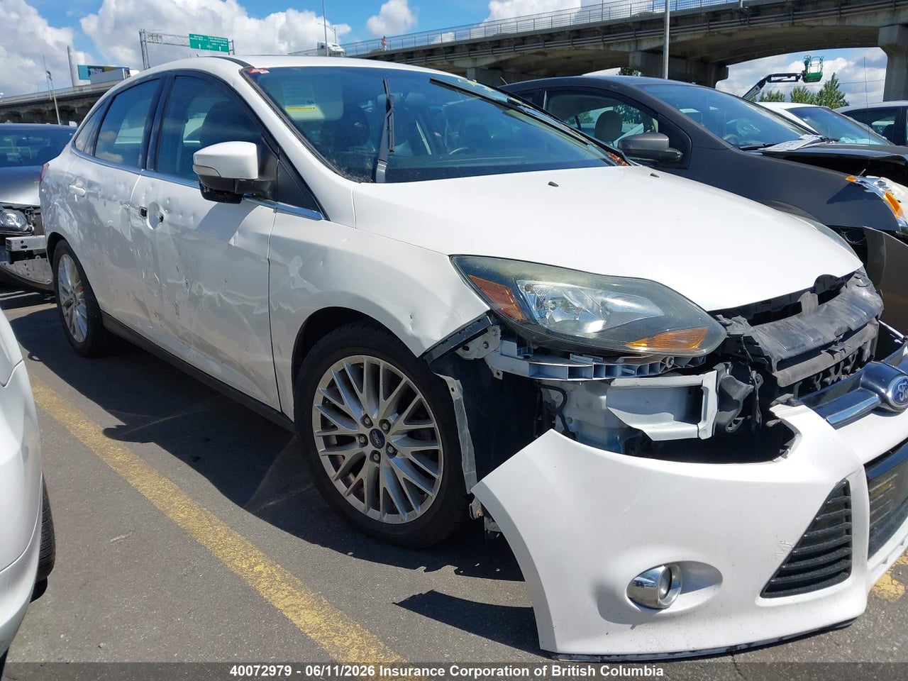 1FADP3J29EL288899 · 2014 FORD FOCUS TITANIUM