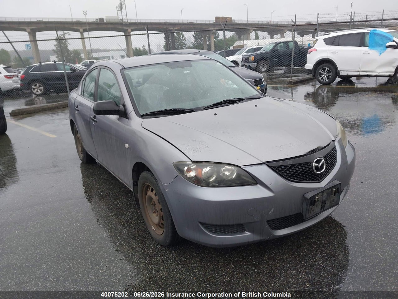JM1BK12F951285101 · 2005 MAZDA 3 I