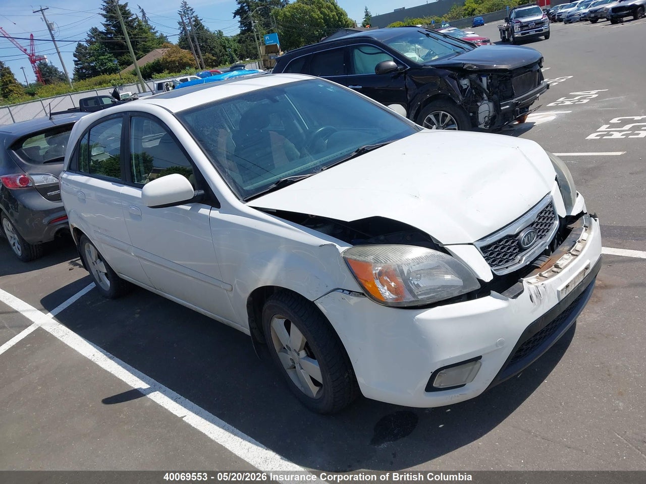 KNADH5A32A6606170 · 2010 KIA RIO LX/SX