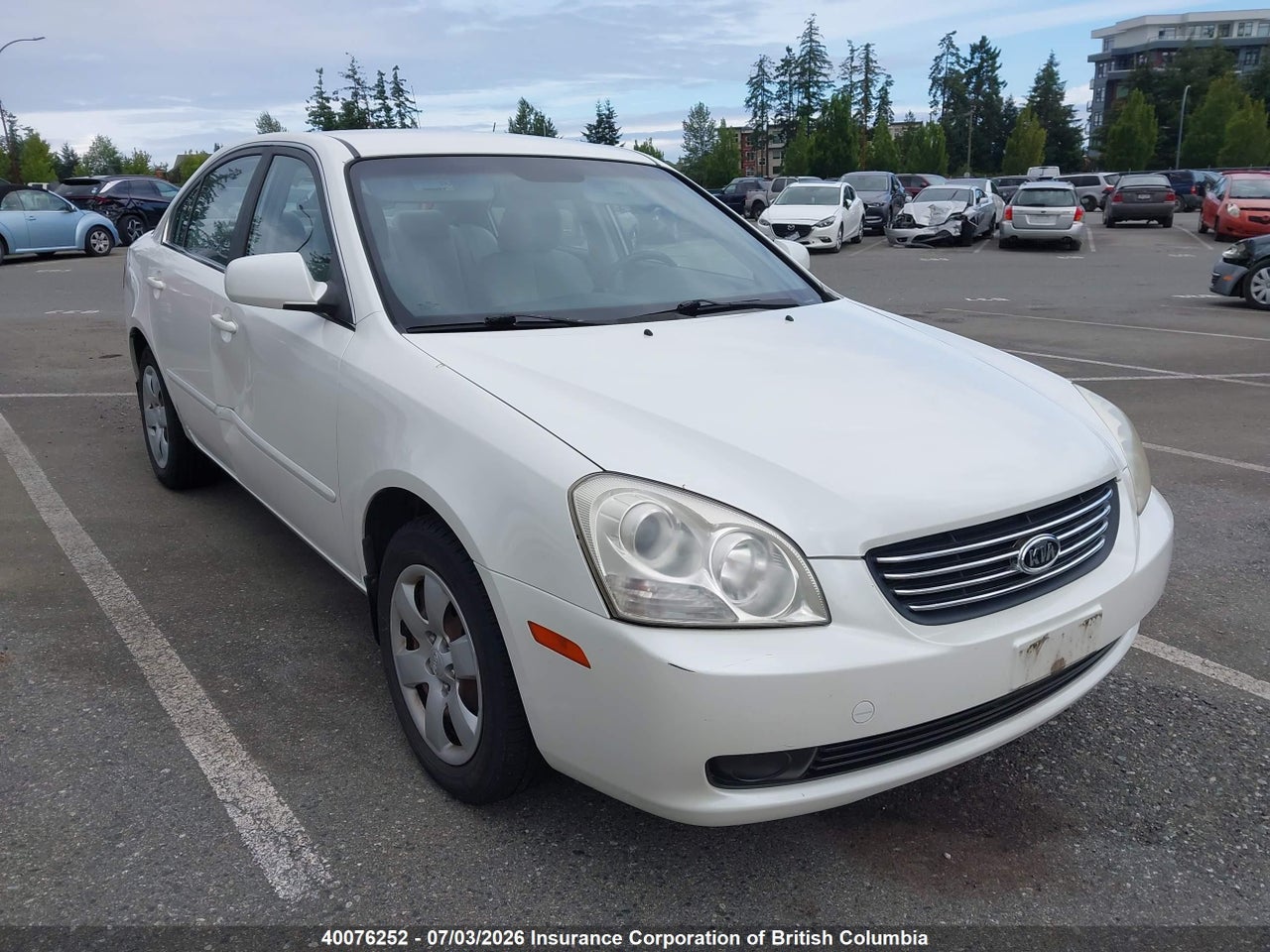 KNAGE123X75058494 · 2007 KIA OPTIMA LX/EX · 1/12