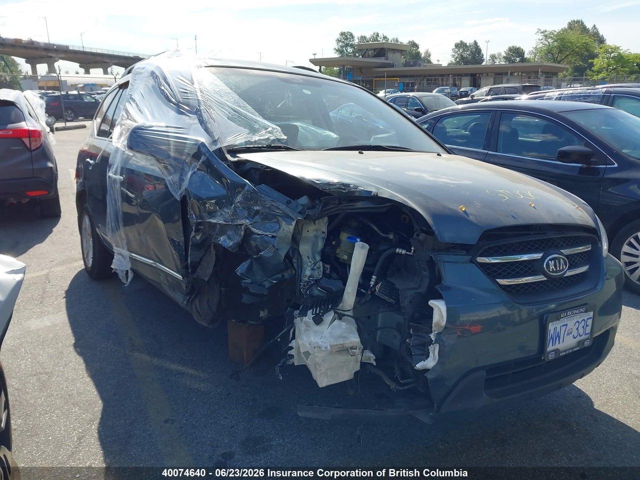 KNAFG528797277512 · 2009 KIA RONDO LX/EX