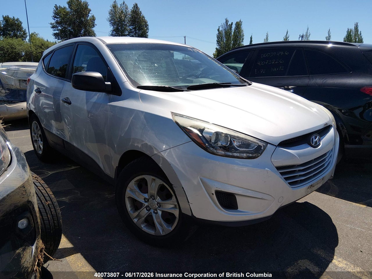 KM8JT3AF6EU893528 · 2014 HYUNDAI TUCSON GLS