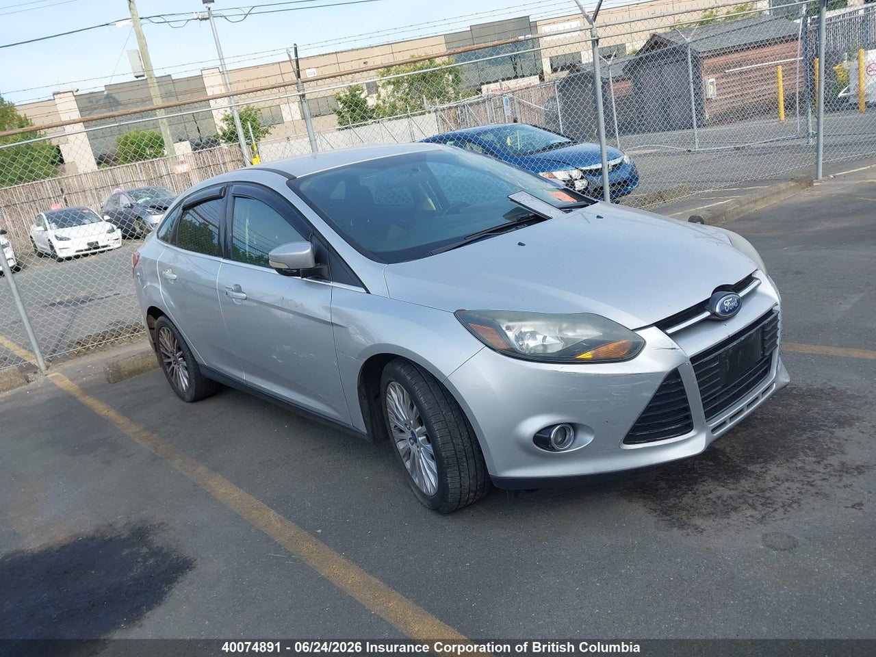 1FAHP3J24CL180480 · 2012 FORD FOCUS TITANIUM