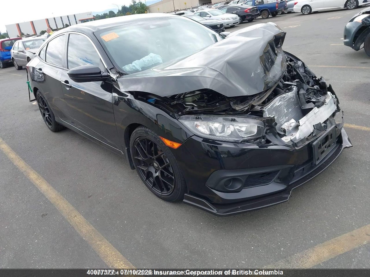 2HGFC2F64JH029637 · 2018 HONDA CIVIC LX · 1/12