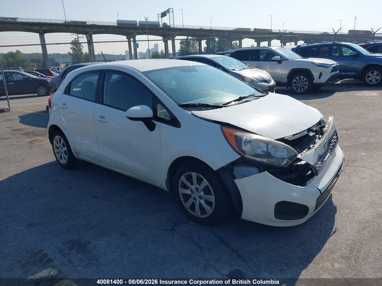 KNADM5A33E6946056 · 2014 KIA RIO LX
