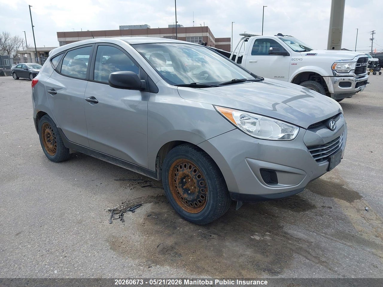 KM8JTCAC8CU322240 · 2012 HYUNDAI TUCSON GL
