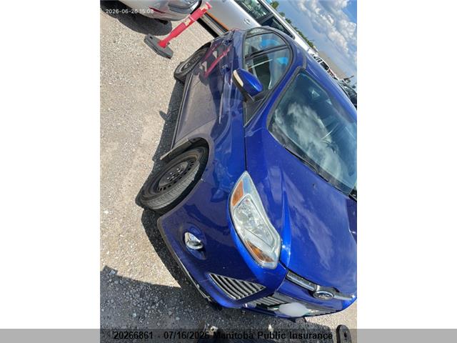 1FAHP3K28CL401531 · 2012 FORD FOCUS SE