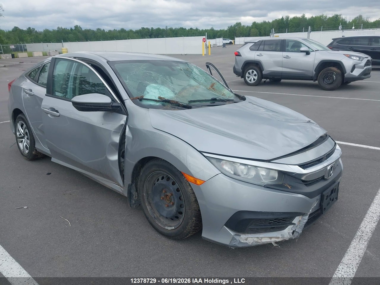2HGFC2F55HH004571 · 2017 HONDA CIVIC LX · 1/12