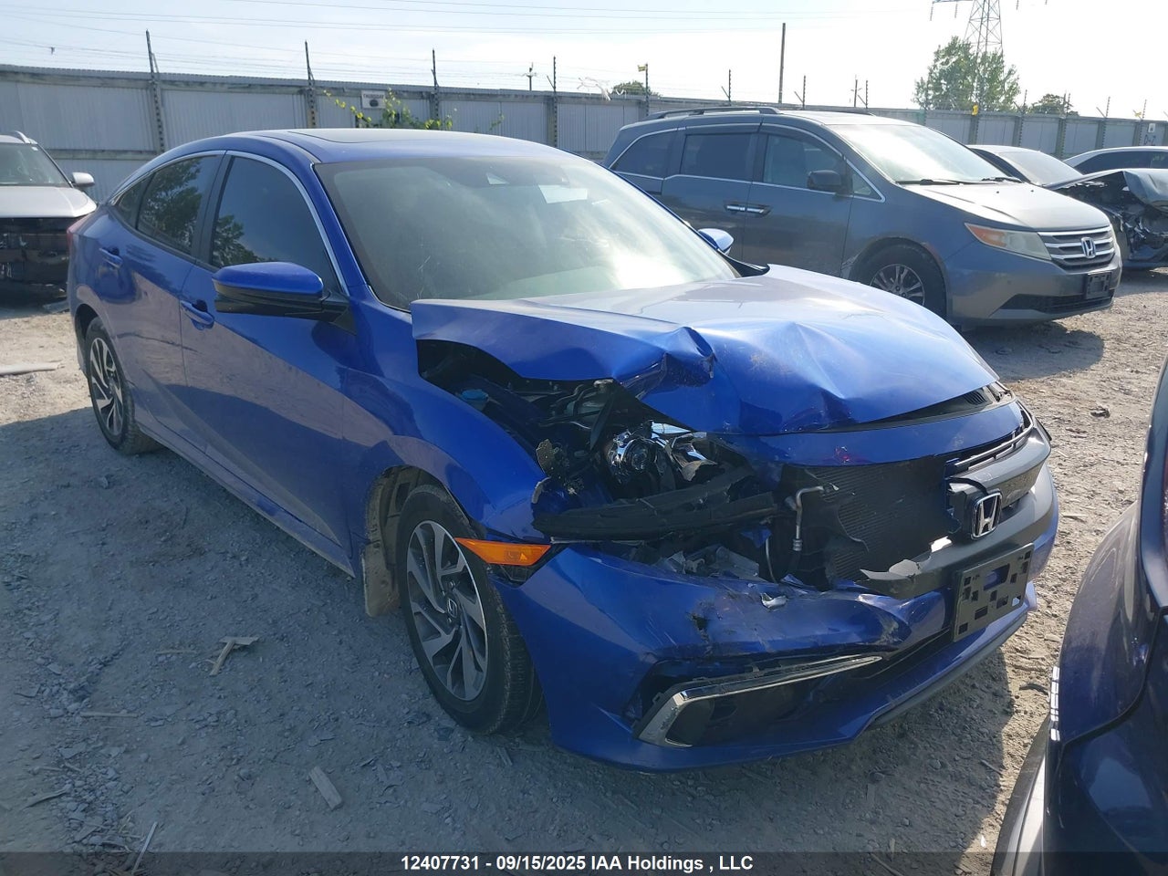2HGFC2F77KH037323 · 2019 HONDA CIVIC EX