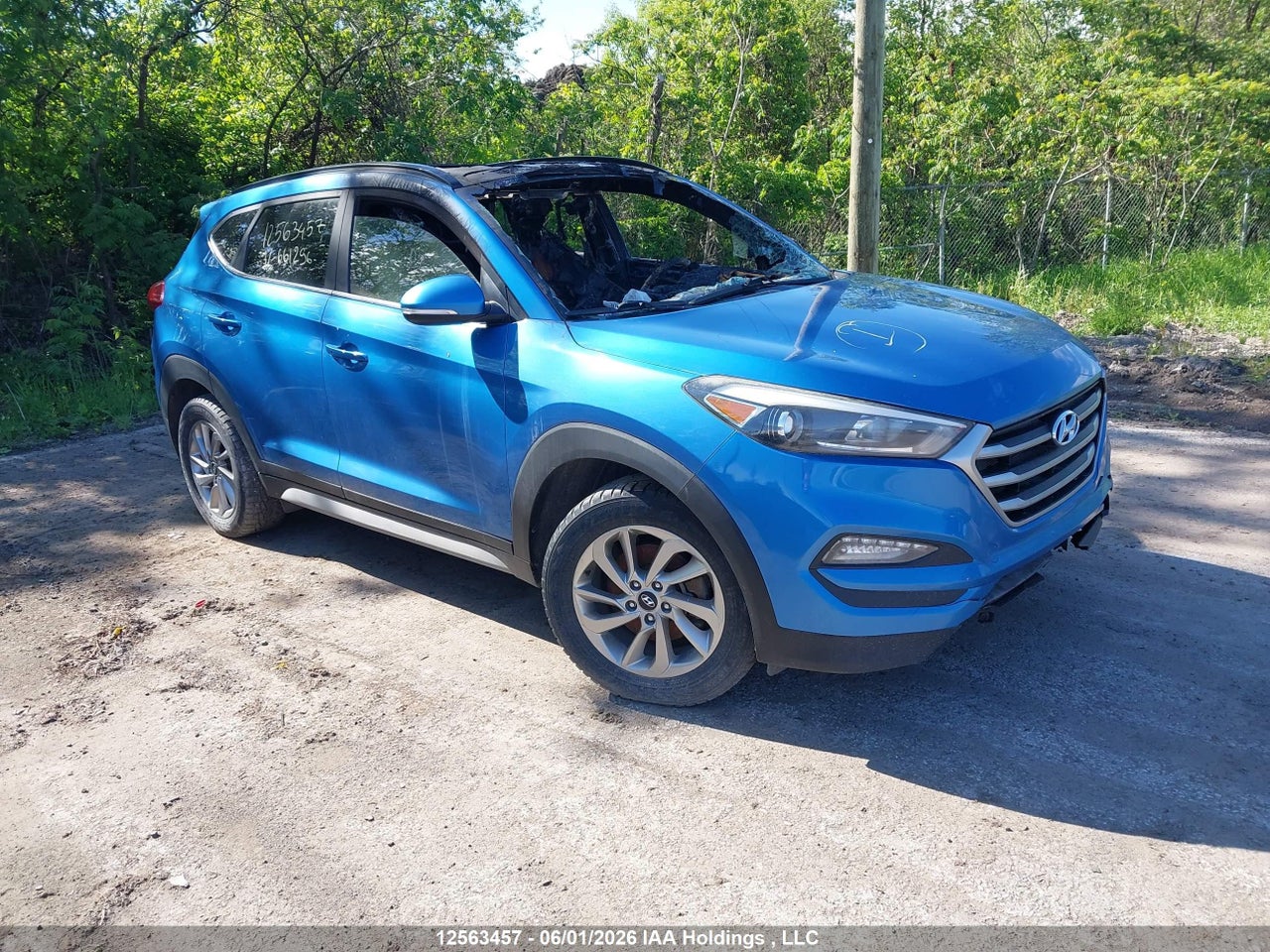 KM8J3CA41JU661296 · 2018 HYUNDAI TUCSON · 1/12