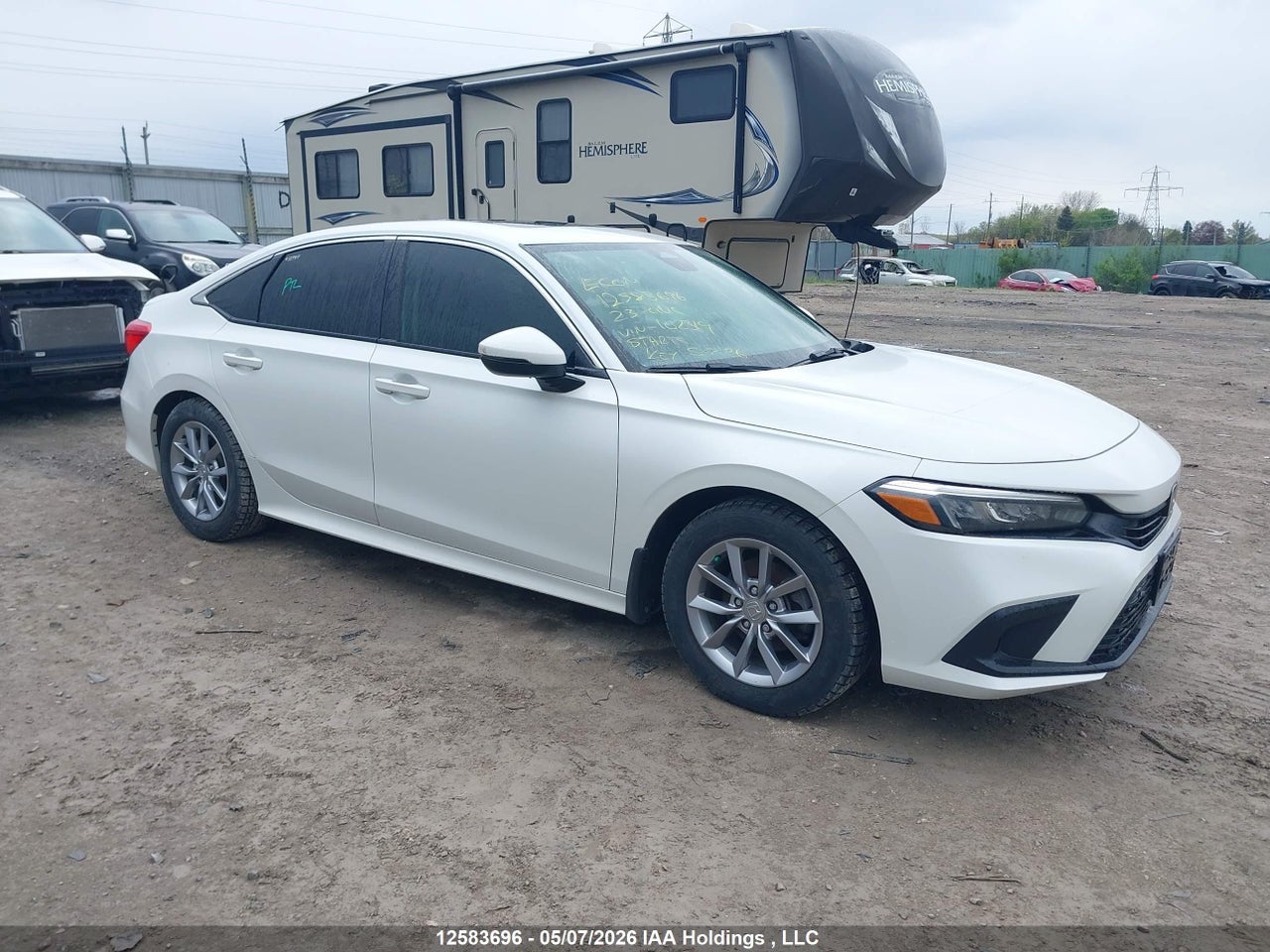 2HGFE2F34PH102319 · 2023 HONDA CIVIC EX 4DR