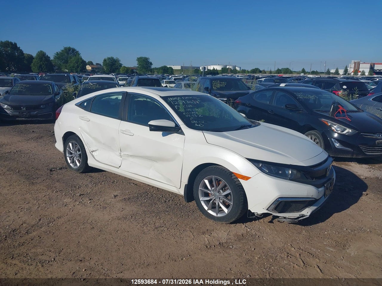 2HGFC2F76KH043095 · 2019 HONDA CIVIC EX