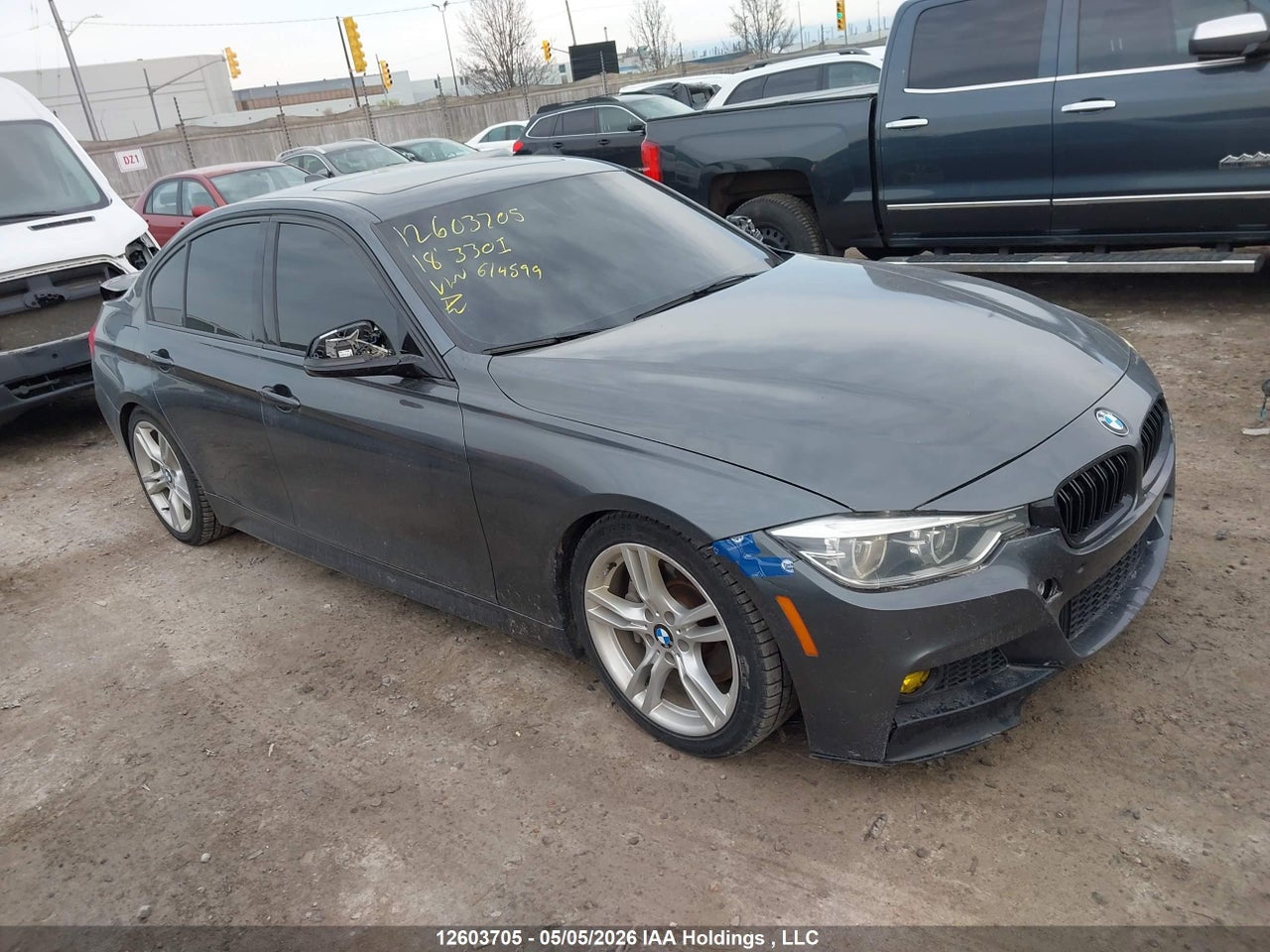 WBA8D9C55JA614599 · 2018 BMW 330I XDRIVE