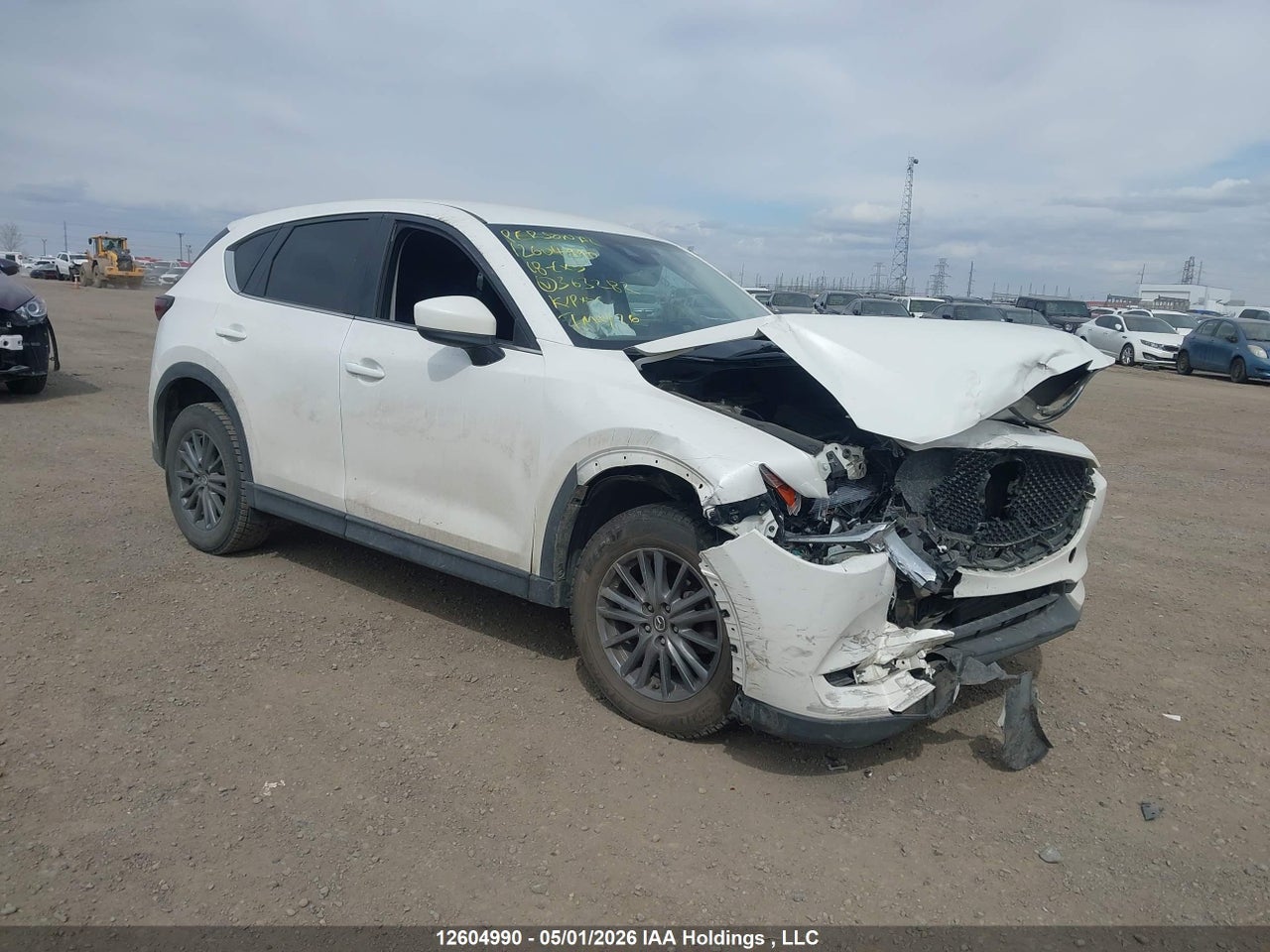 JM3KFACM9J1****** · 2018 MAZDA CX-5 TOURING · 1/12