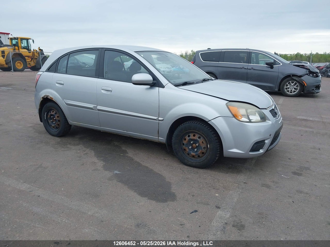 KNADH5B31B6****** · 2011 KIA RIO LX/SX · 1/12