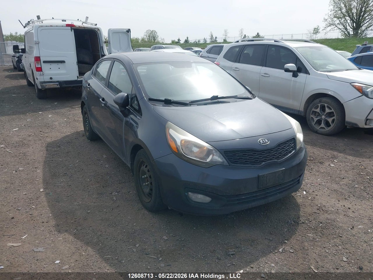 KNADM4A3XD6104677 · 2013 KIA RIO LX