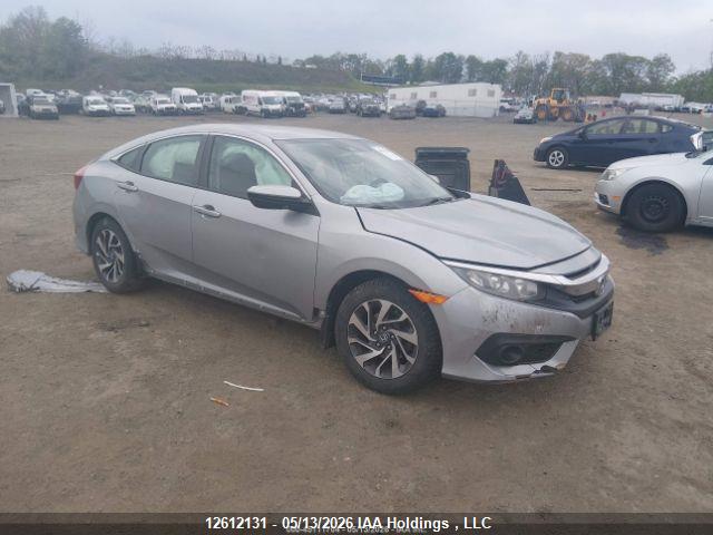 2HGFC2F61JH****** · 2018 HONDA CIVIC LX · 1/12
