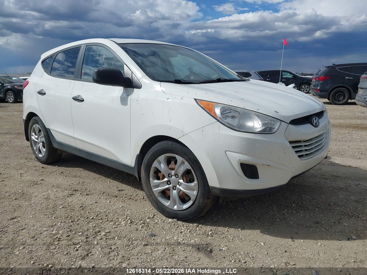 KM8JTCAC5CU496847 · 2012 HYUNDAI TUCSON GL