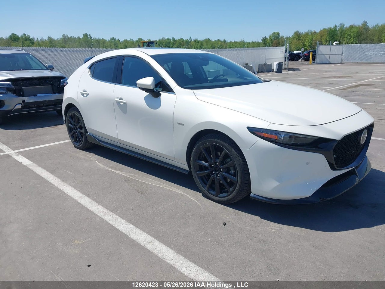JM1BPBJY2M1309571 · 2021 MAZDA 3