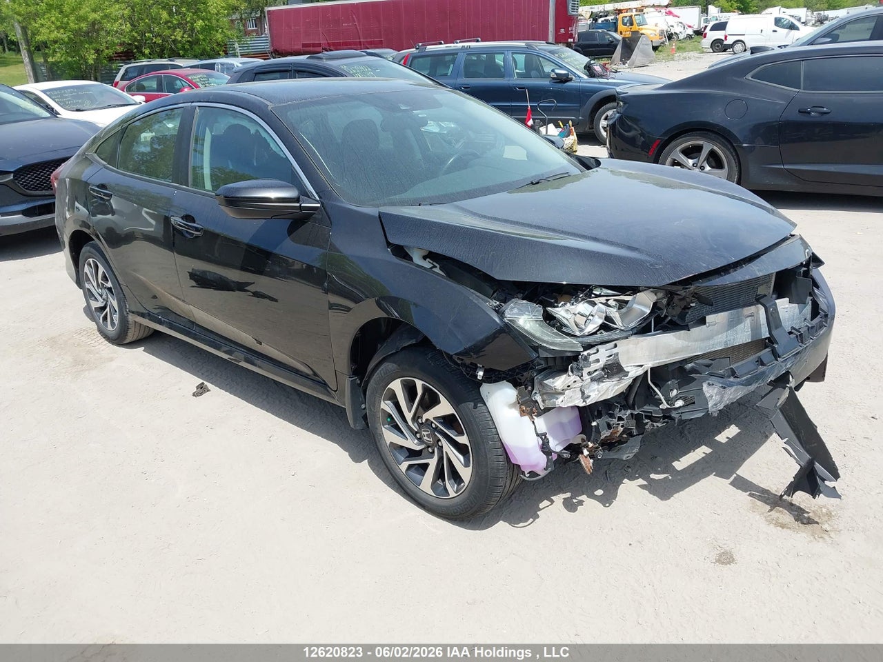 2HGFC2F67JH029647 · 2018 HONDA CIVIC SE