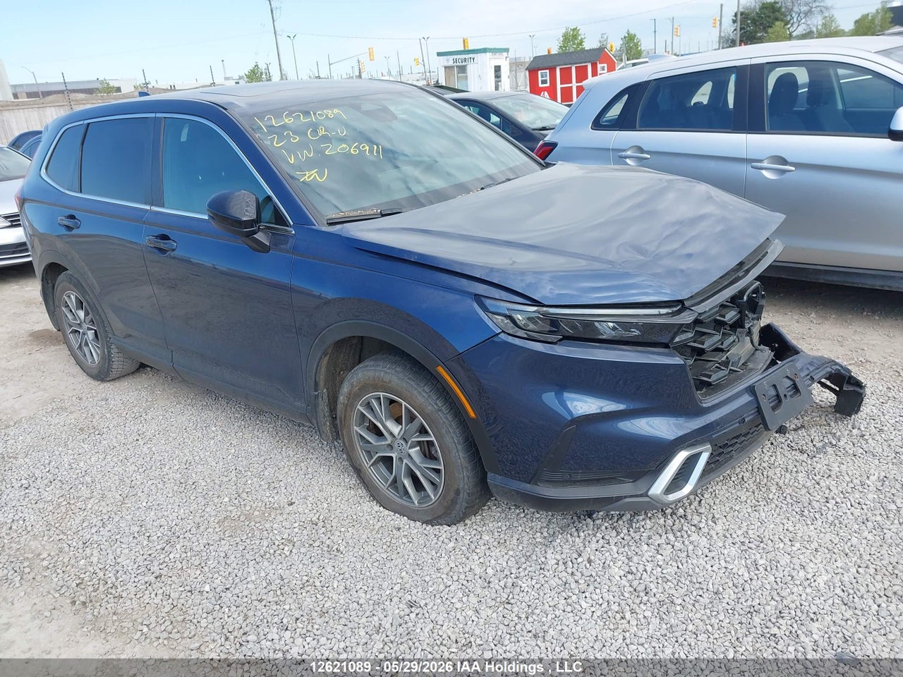 2HKRS6H90PH206911 · 2023 HONDA CR-V TOURING HYBRID