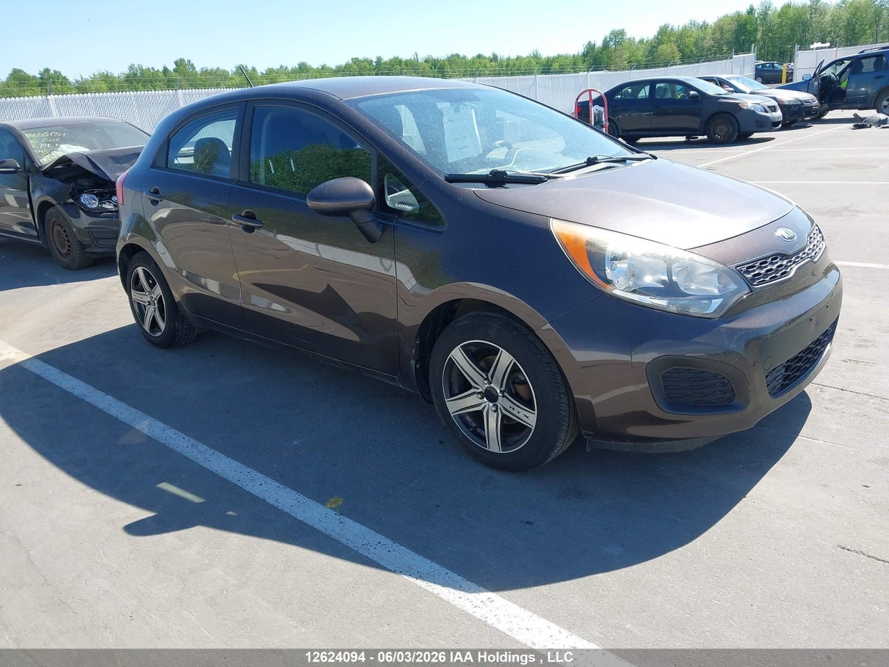 KNADM5A37E6926585 · 2014 KIA RIO